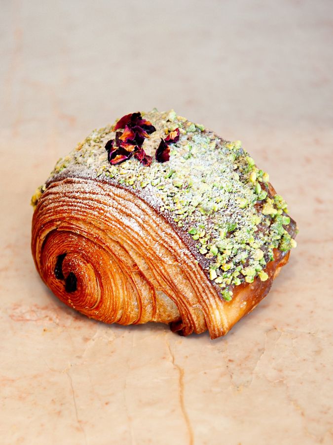 A Pistachio X: croissant dough with pistachio cream and caramelised pistachio